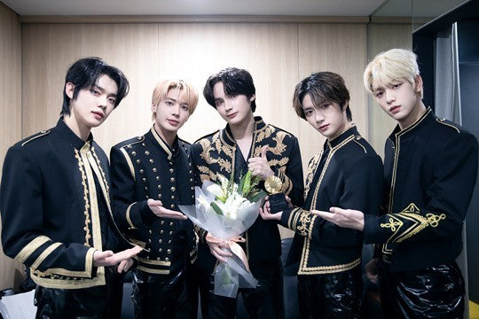 TXT wins 